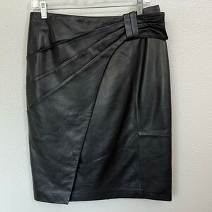 Black leather, asymmetrical, faux wrap pencil skirt by Antonio Milani.